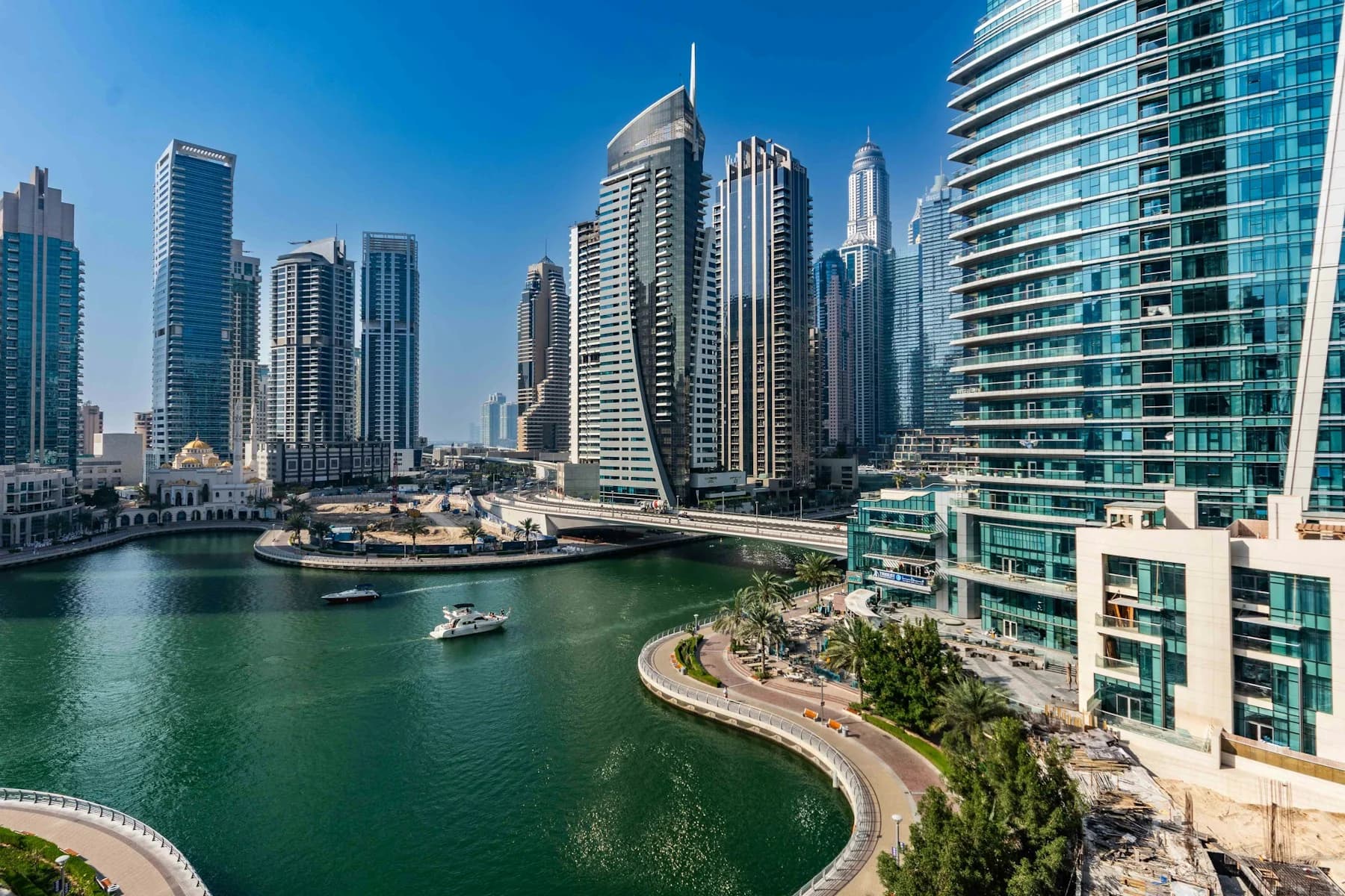Yachts on Dubai Marina surrounded by modern city towers